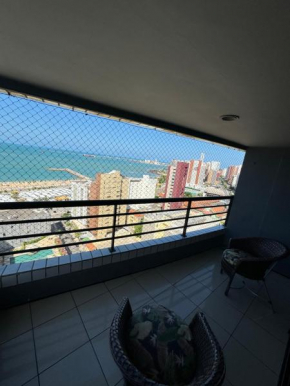 Flat vista mar da beira mar